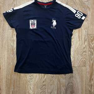 U.S. Polo Assn. Men's Blue Short Sleeve T-Shirt with White Stripes - Size S